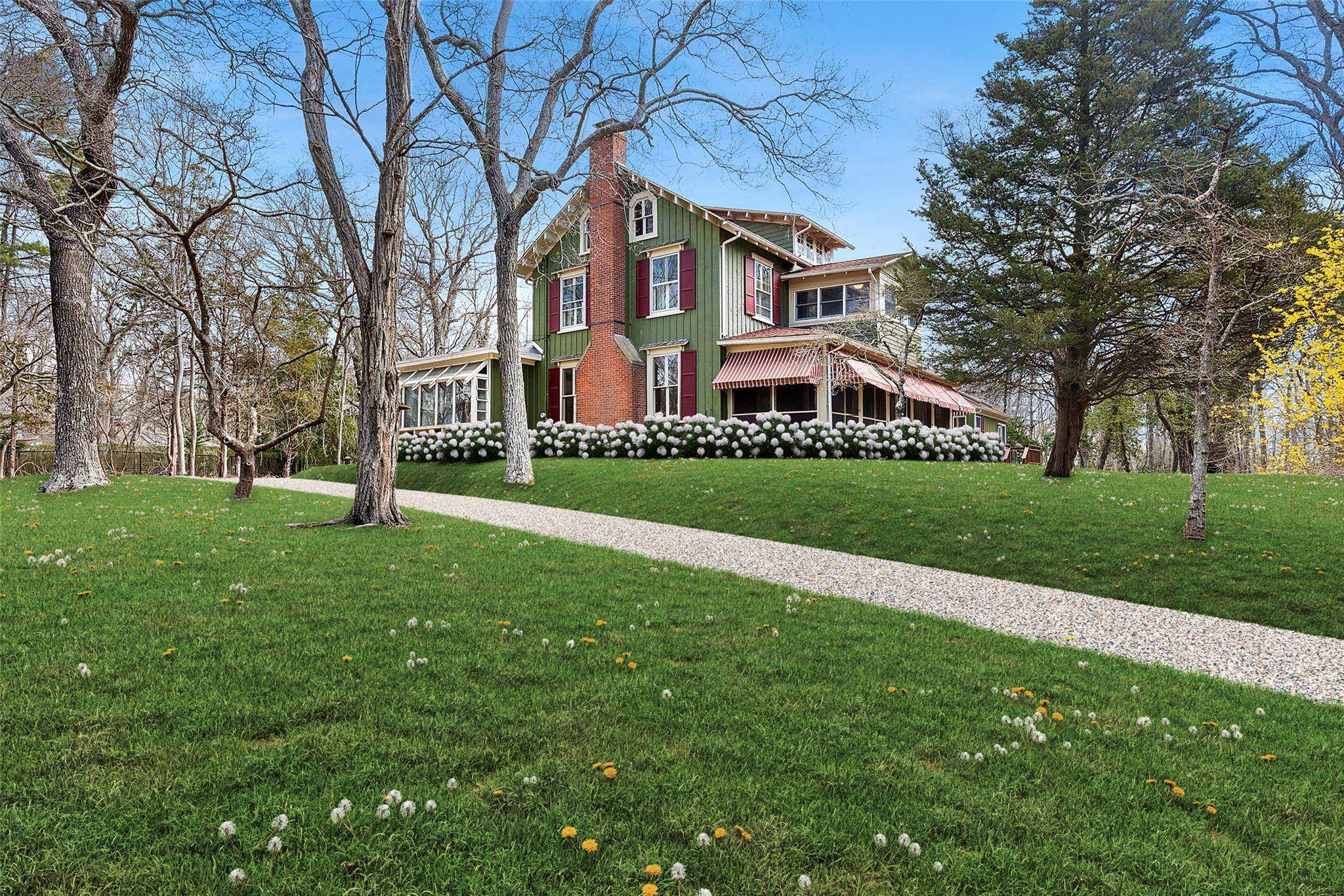 A unique opportunity to curate a legacy property in Nassau Point awaits you.