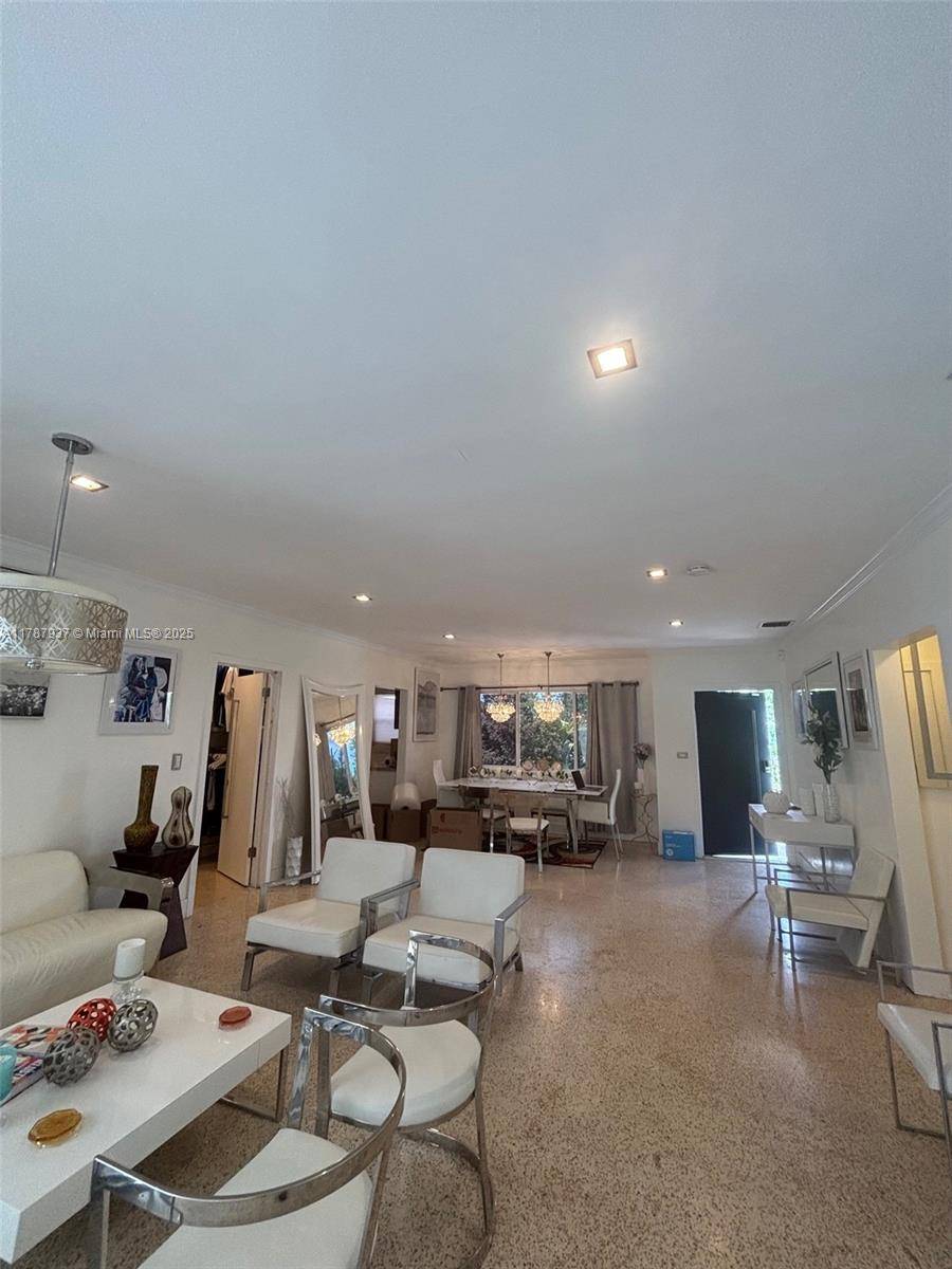 Handyman special ! This 3 bedroom, 2 bath single family home features remodeled bathrooms, high hat lighting, no carpet, and windows that are approximately 10 years old.