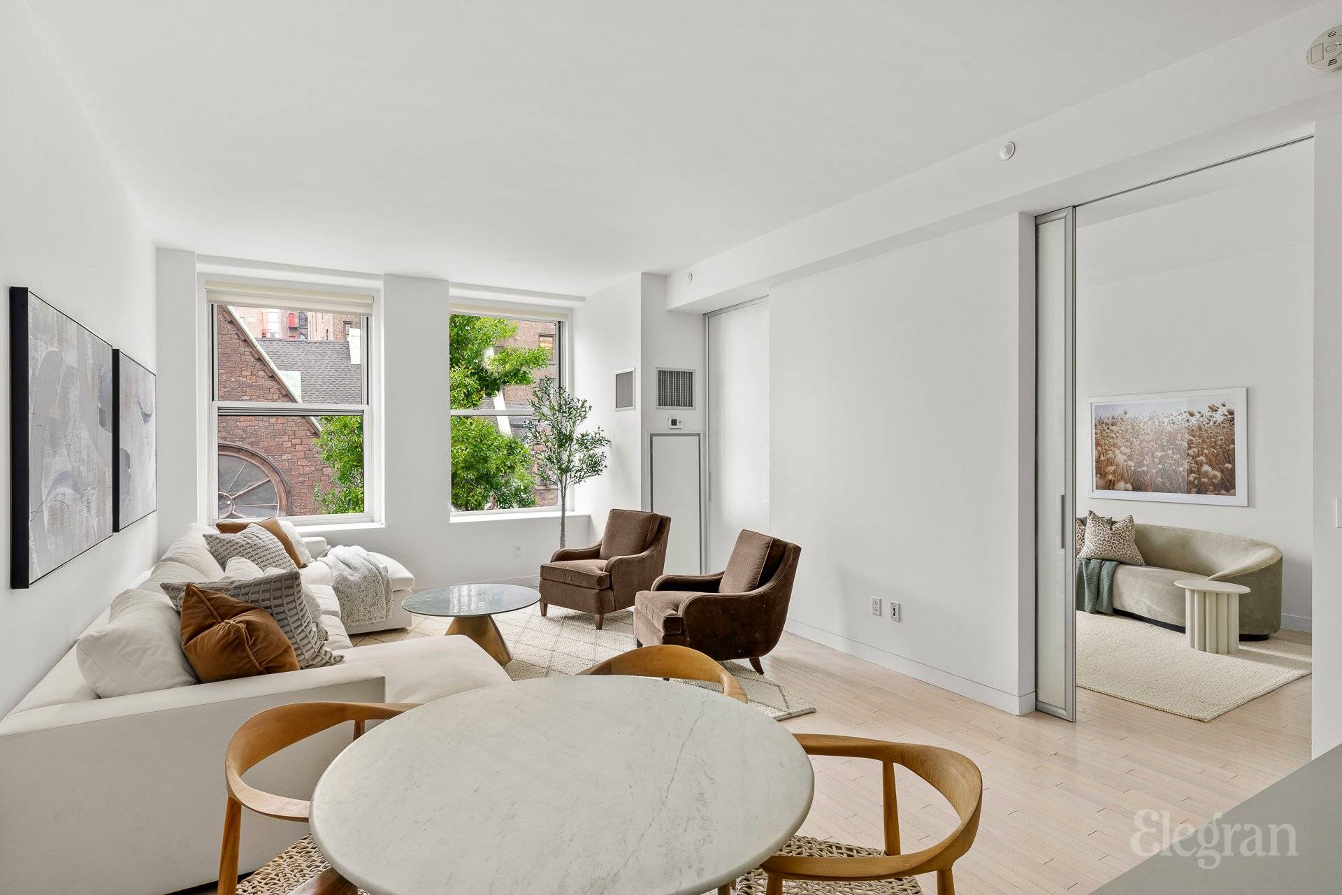 Stunning 2 Bedroom plus home office condominium with Chef s Kitchen, Bonus Room, and Expansive Storage in Chelsea Flatiron.