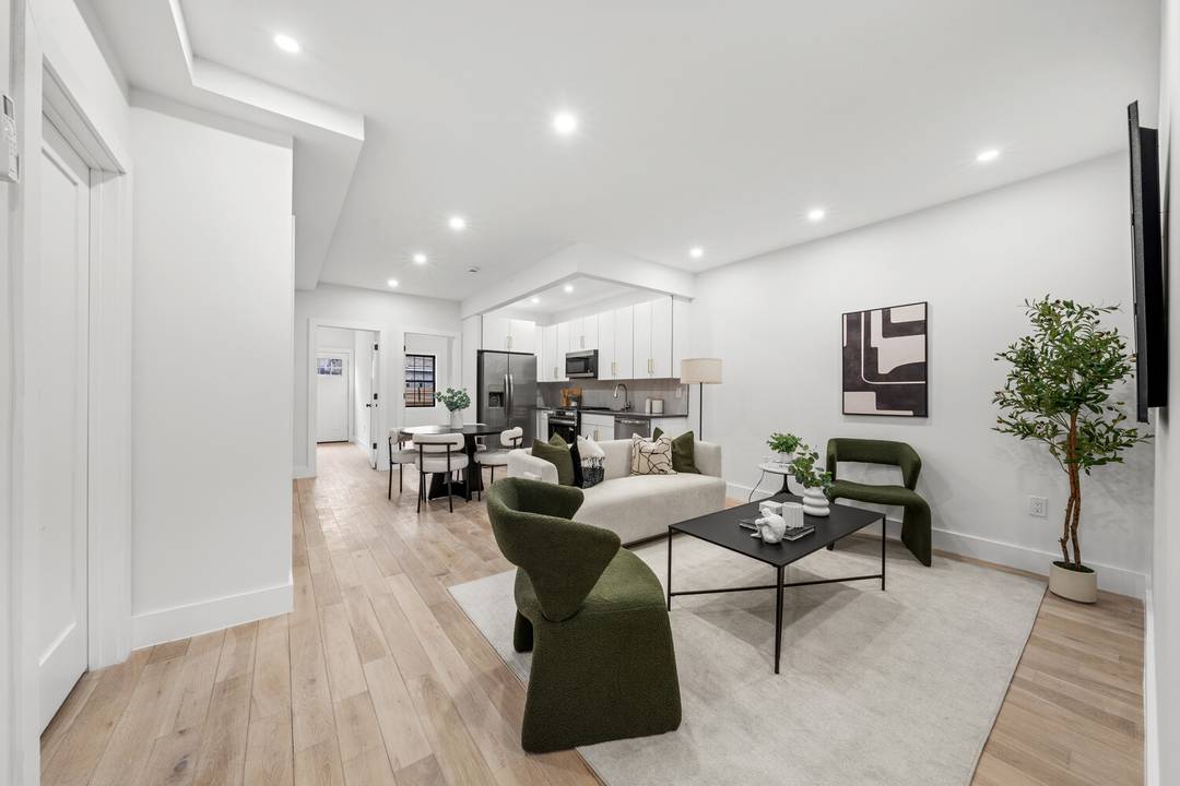 I am pleased to present 355 East 51st Street, a masterfully renovated two unit townhouse in East Flatbush.
