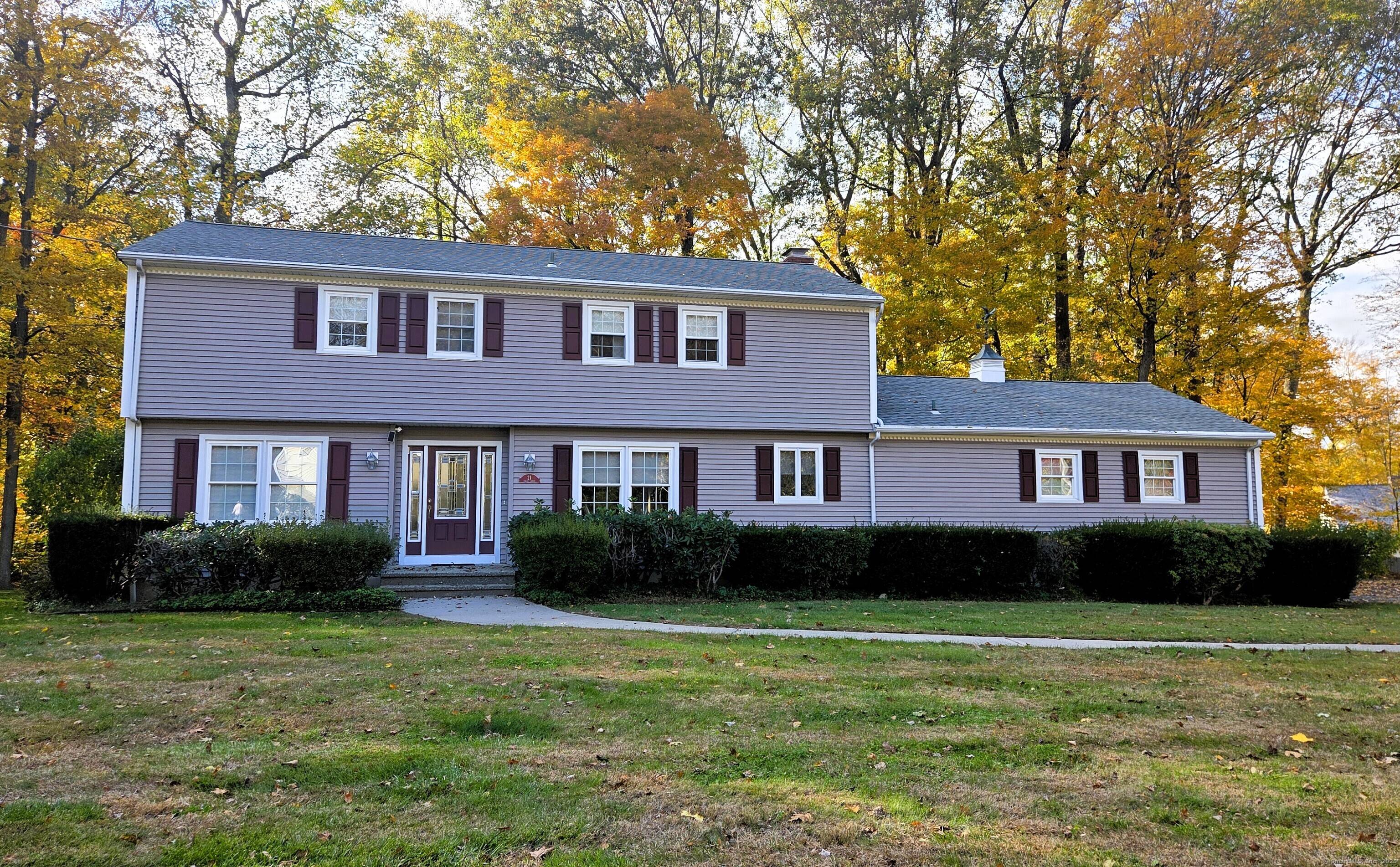 Perfectly sited on a level, conveniently located property, this inviting home blends comfort, functionality, and style.