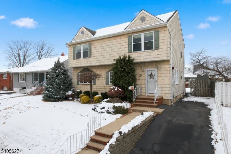 Welcome home to 90 Coolidge Avenue, a spacious and well maintained two story Colonial located on a quiet residential street in Carteret.