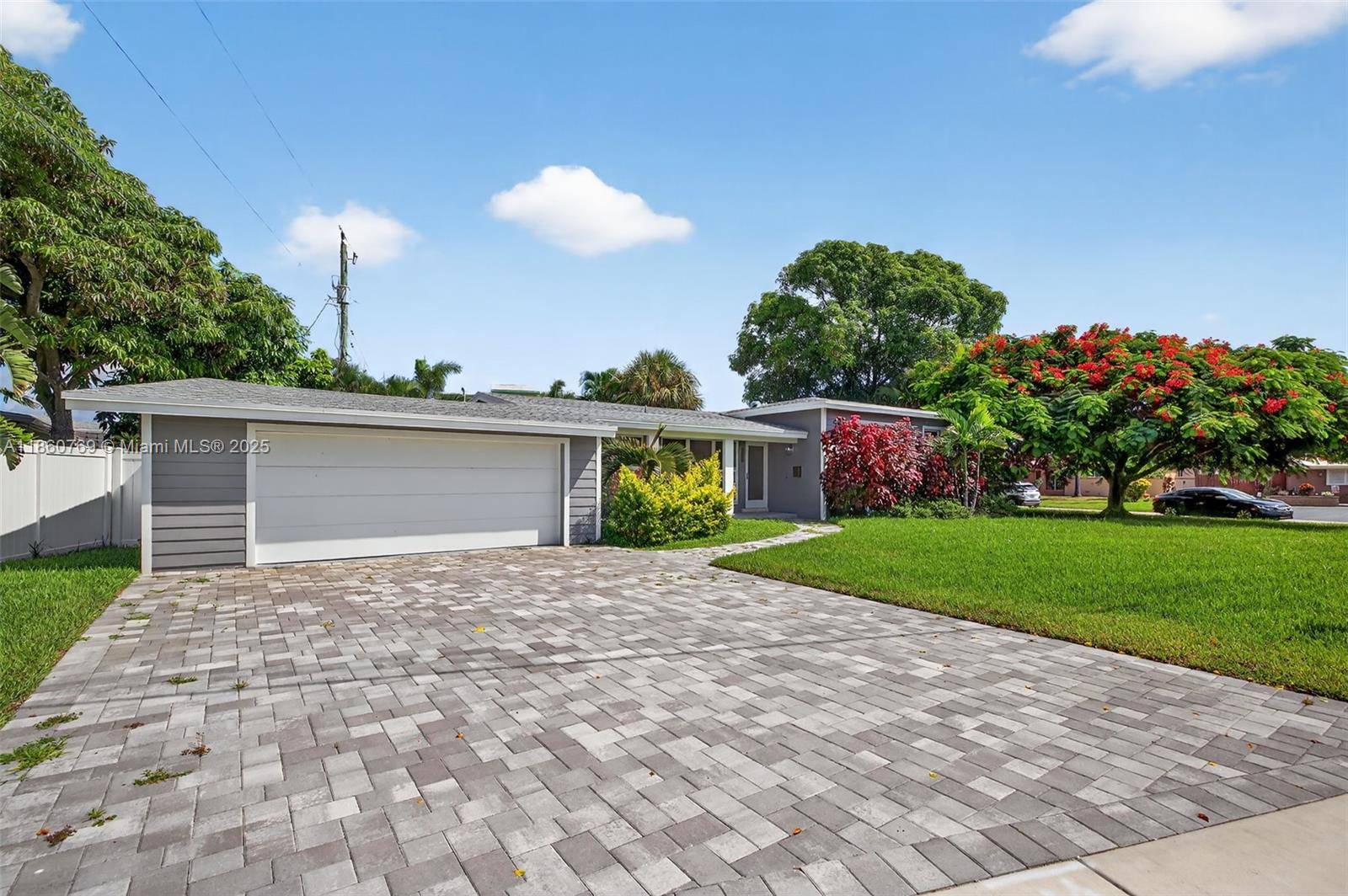 Completely Renovated open concept, 3 bedroom 2 bath 2 car garage amp ; pool with the finest Upgrades in this Mid Century Marvel home.