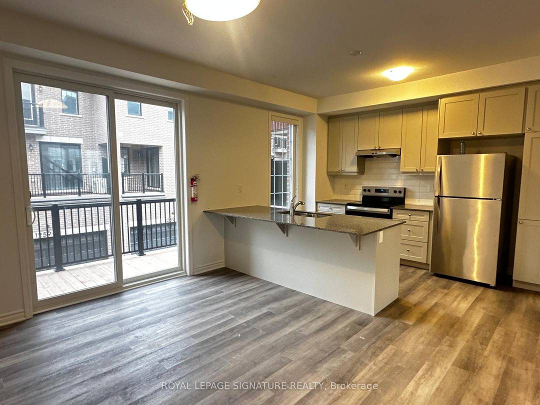 Welcome to 1259 Lily Crescent, Milton, a family friendly townhome in a quiet, safe neighbourhood managed by Conestoga Off Campus Housing.