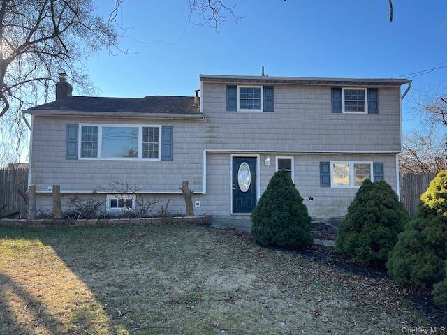 Opportunity awaits at this 4 bedroom split level home located on a quiet residential street.