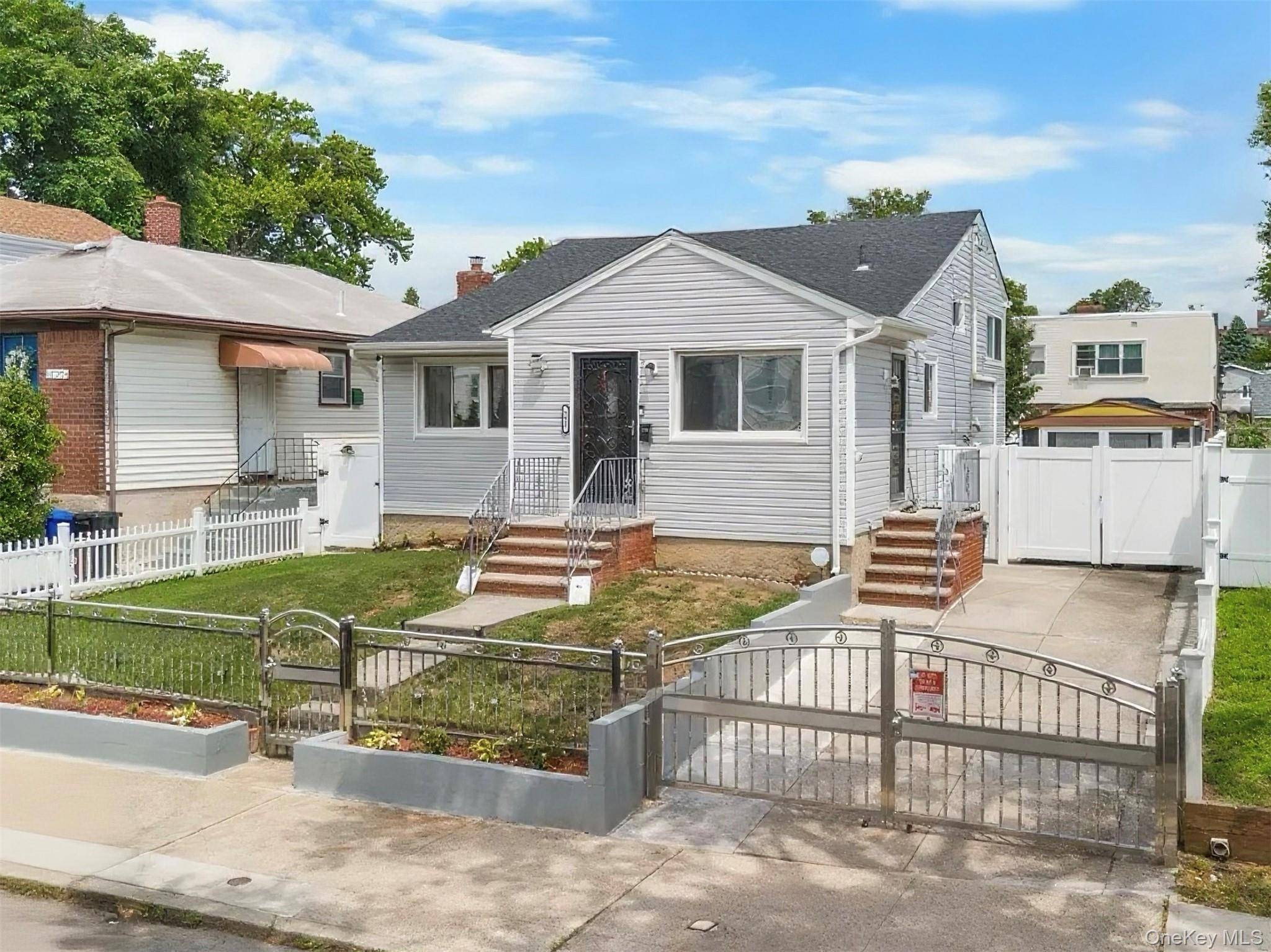Welcome to this beautifully maintained and bright split level single family home in College Point.