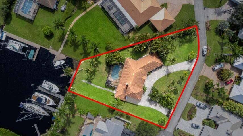 Beautifully renovated waterfront home in Beau Rivage with ocean access.