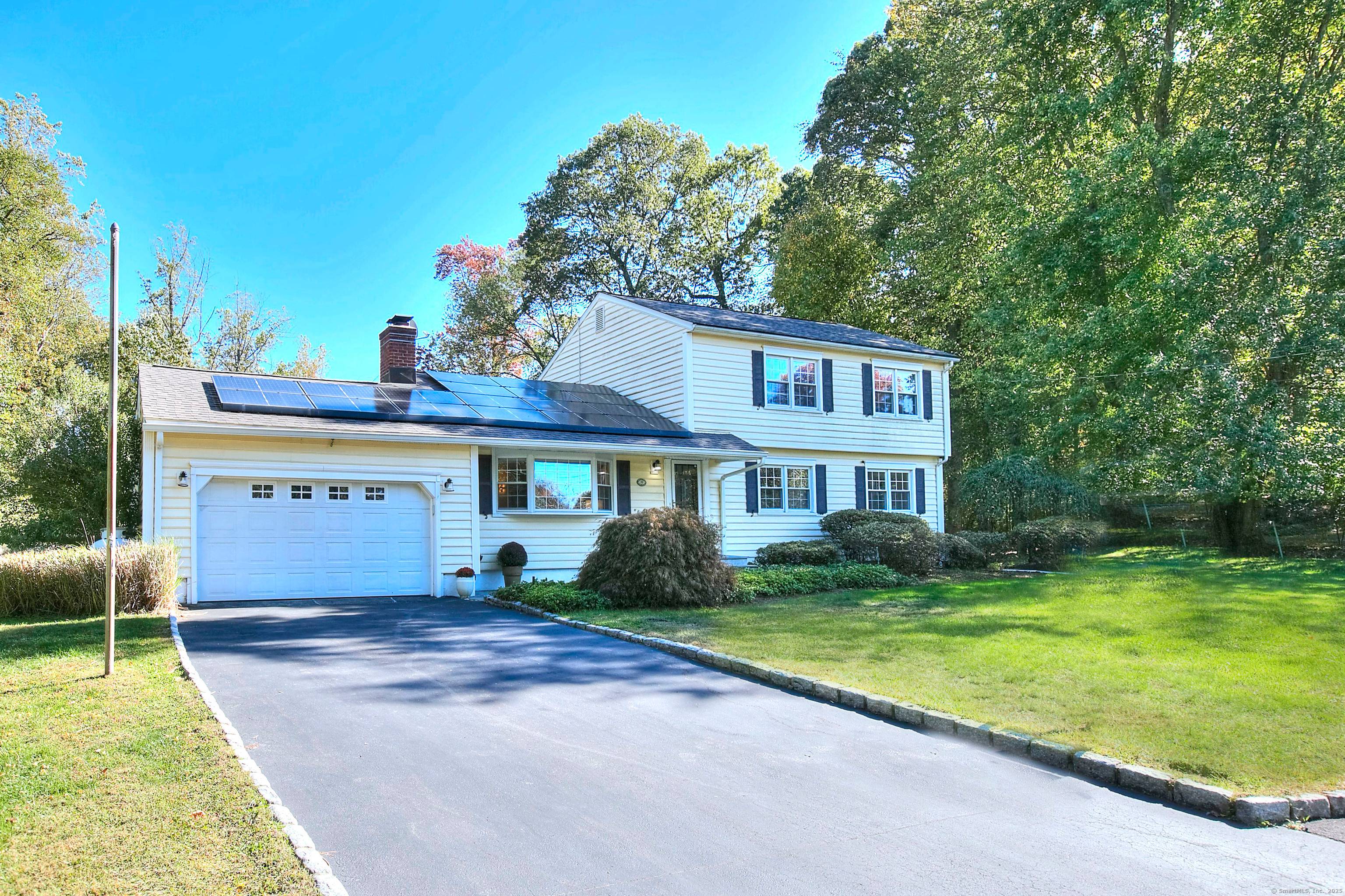 Envision your next chapter at 19 Woodchuck Court, a beautifully maintained Colonial at the end of a quiet cul de sac in Norwalk's desirable Flax Hill neighborhood.