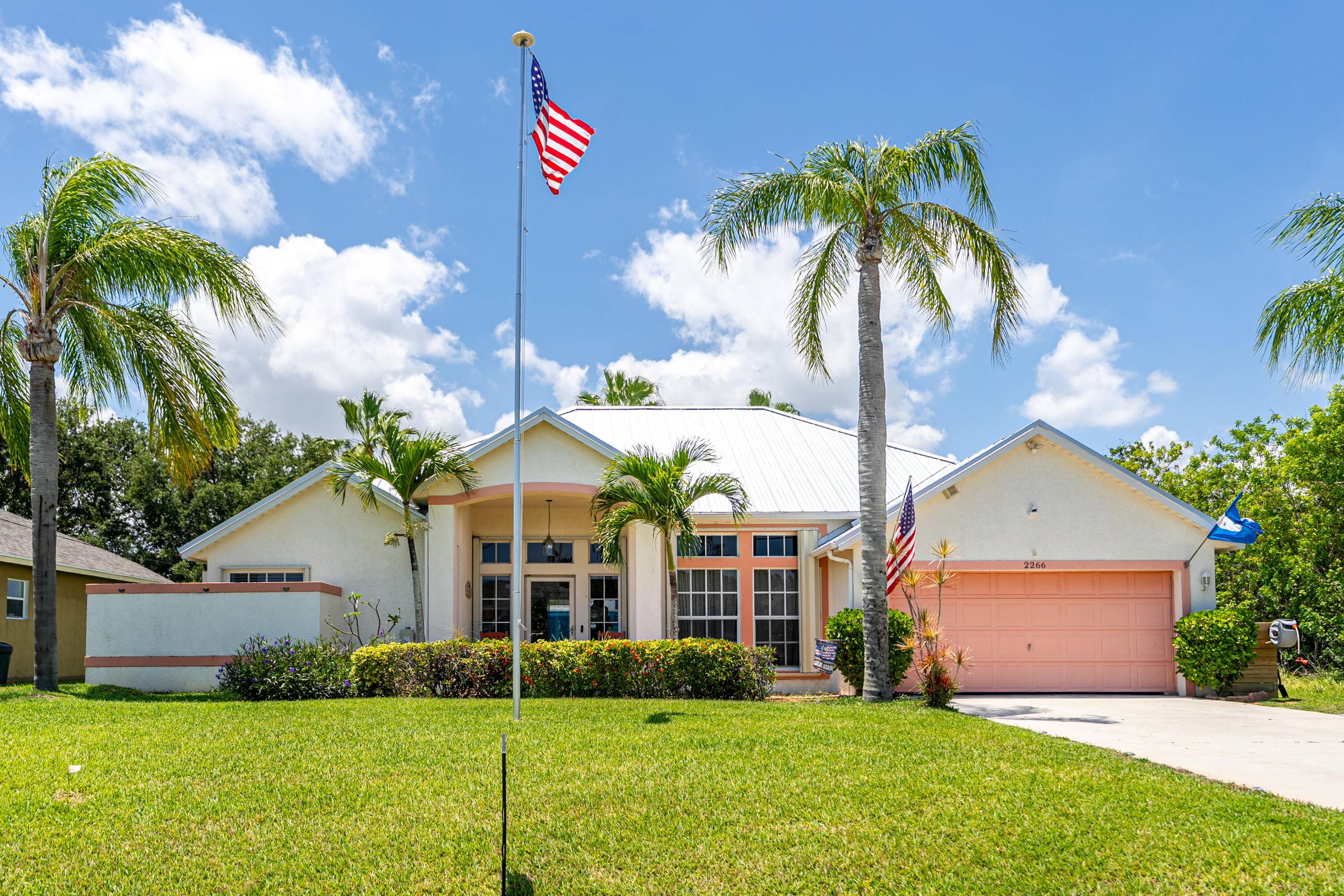 YOUR TROPICAL PARADISE FOUND IN THIS GORGEOUS THREE BEDROOM, TWO BATHROOM CBS POOL HOME FEATURING AN IDEAL SPLIT BEDROOM FLOOR PLAN WITH FORMAL LIVING, DINING AND SEPARATE FAMILY ROOM.