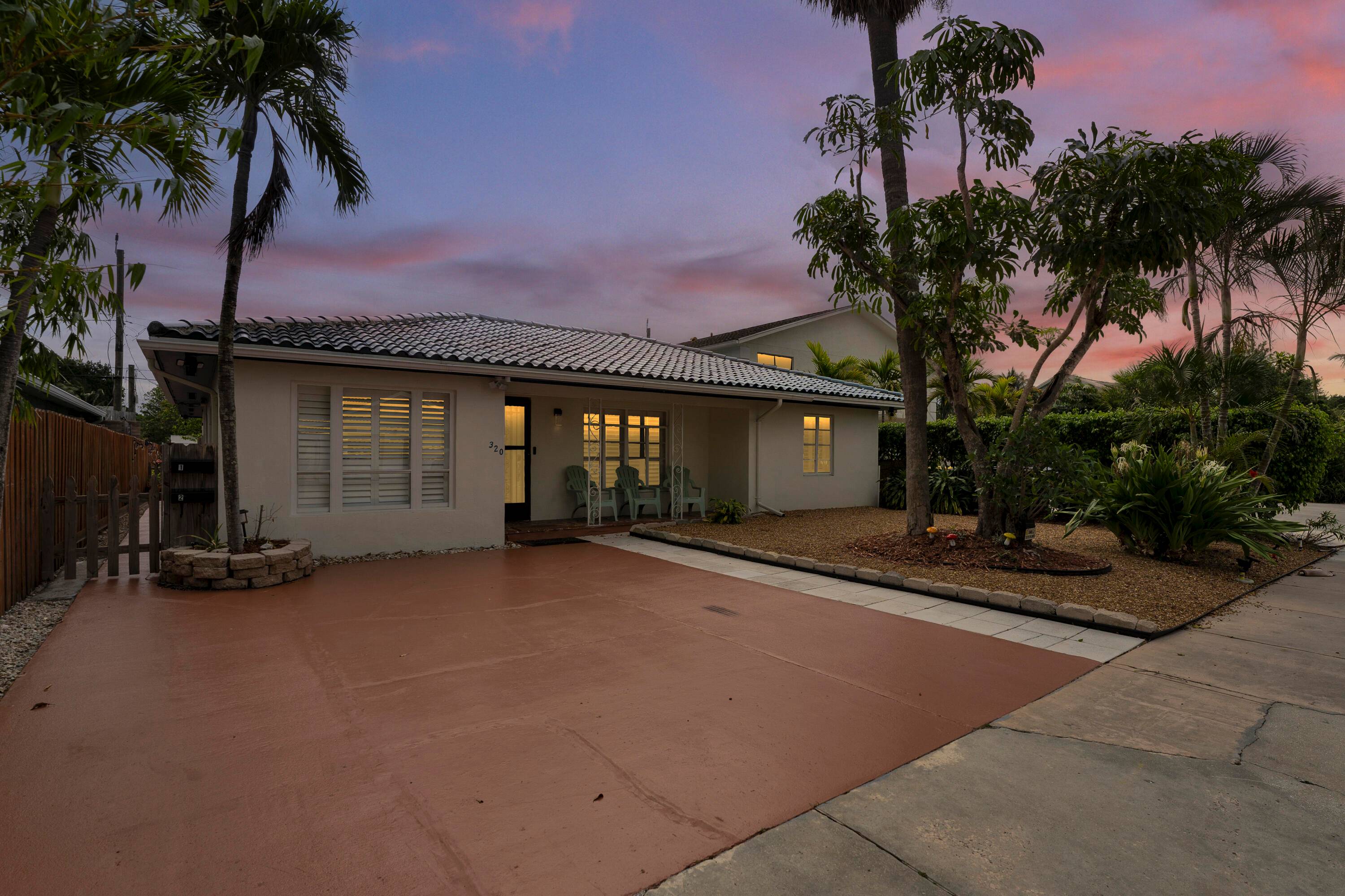 Resort style living awaits in this stunning Lake Worth Beach property.
