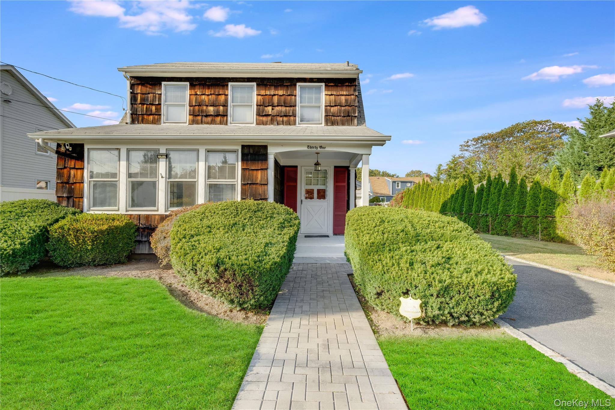 WEST VILLAGE COLONIAL ON AN OVERSIZED LOT Welcome to 31 Chestnut Street Westbury, located in the most desirable and sought after West Village Community.