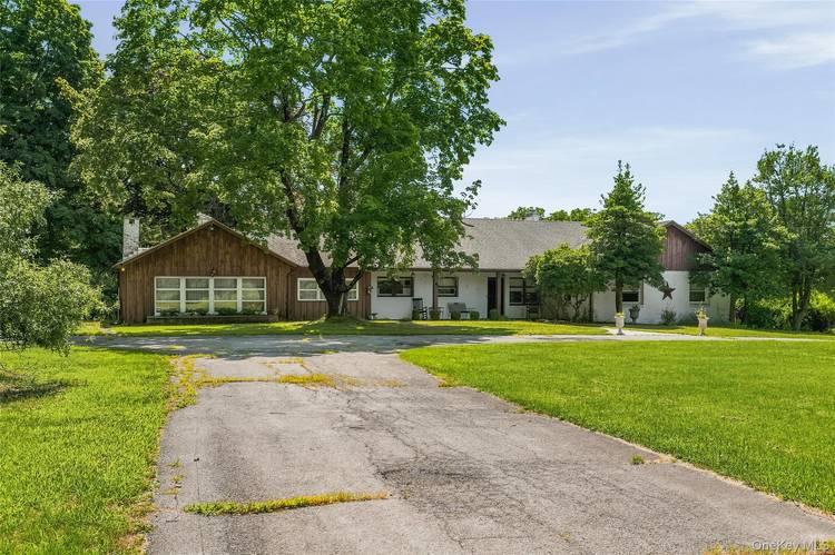 ONE OF A KIND ! FABULOUS HOME OF APPROXIMATELY 6 ACRES WITH MORE THAN 450 FEET FRONTAGE ON CROMWELL HILL.
