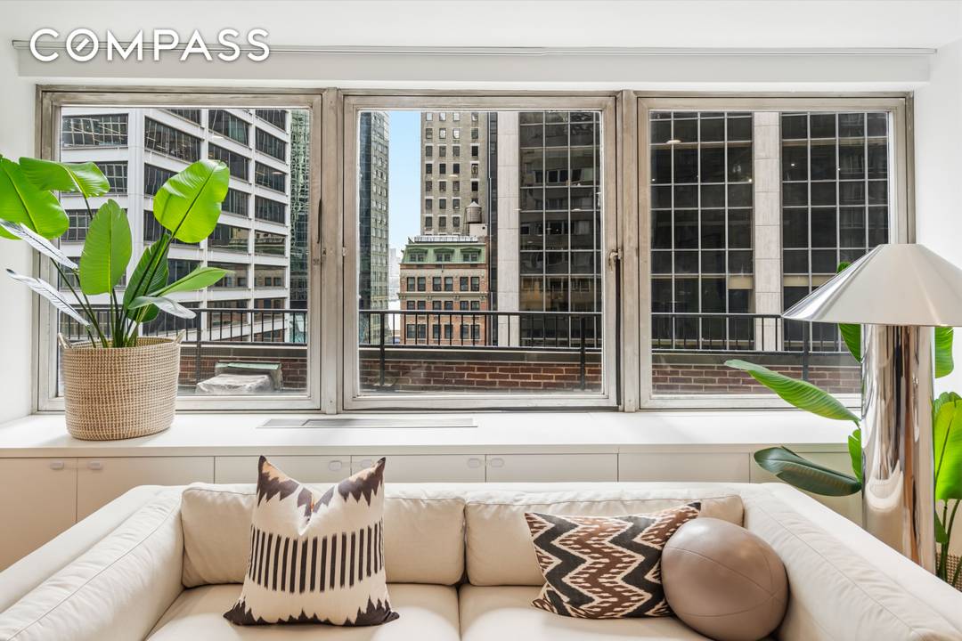 Welcome to Residence 7K at The Seaport South Condominium, a bright and inviting corner one bedroom offering oversized windows, beautiful Eastern and Northern exposures, and a thoughtfully designed layout with ...