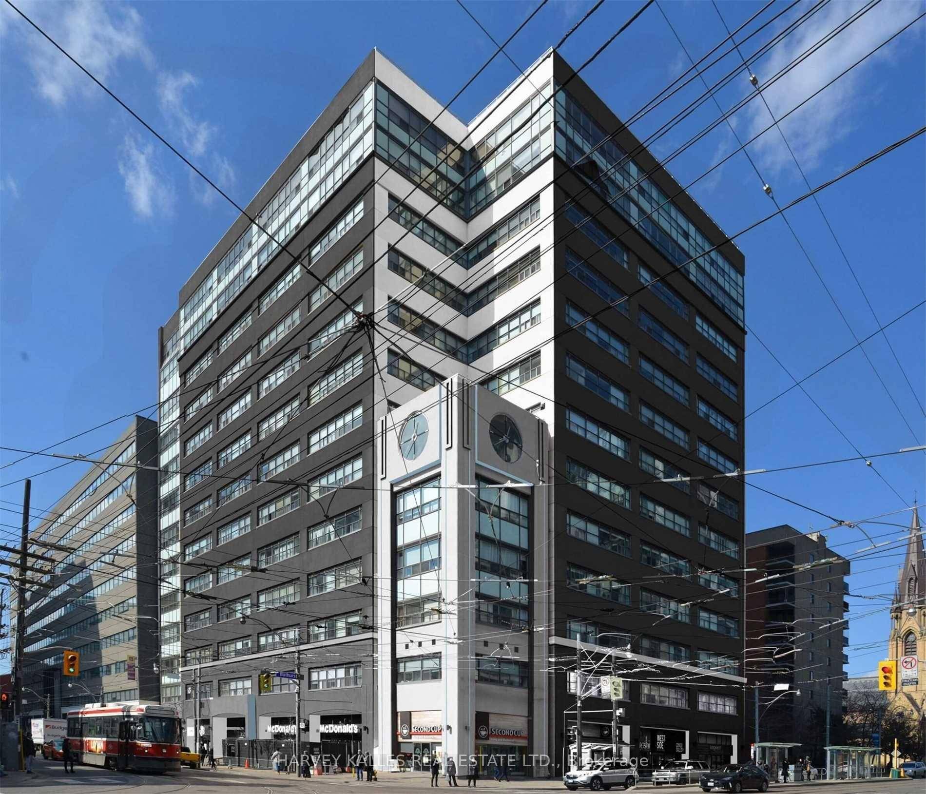 GREAT NEW PRICE ! Experience true loft living in this expansive and beautifully appointed 1, 025 sq ft condo in one of Toronto's few authentic hard loft conversions.