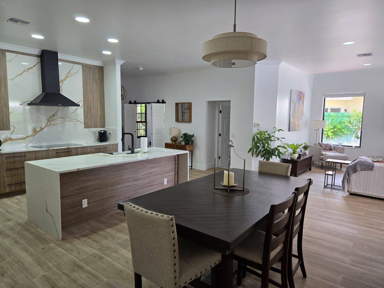 Beautifully remodeled and inviting home featuring 3 bedrooms, 2 bathrooms, and an additional multi purpose room ideal for a mother in law suite, office, 4th bedroom, or efficiency.