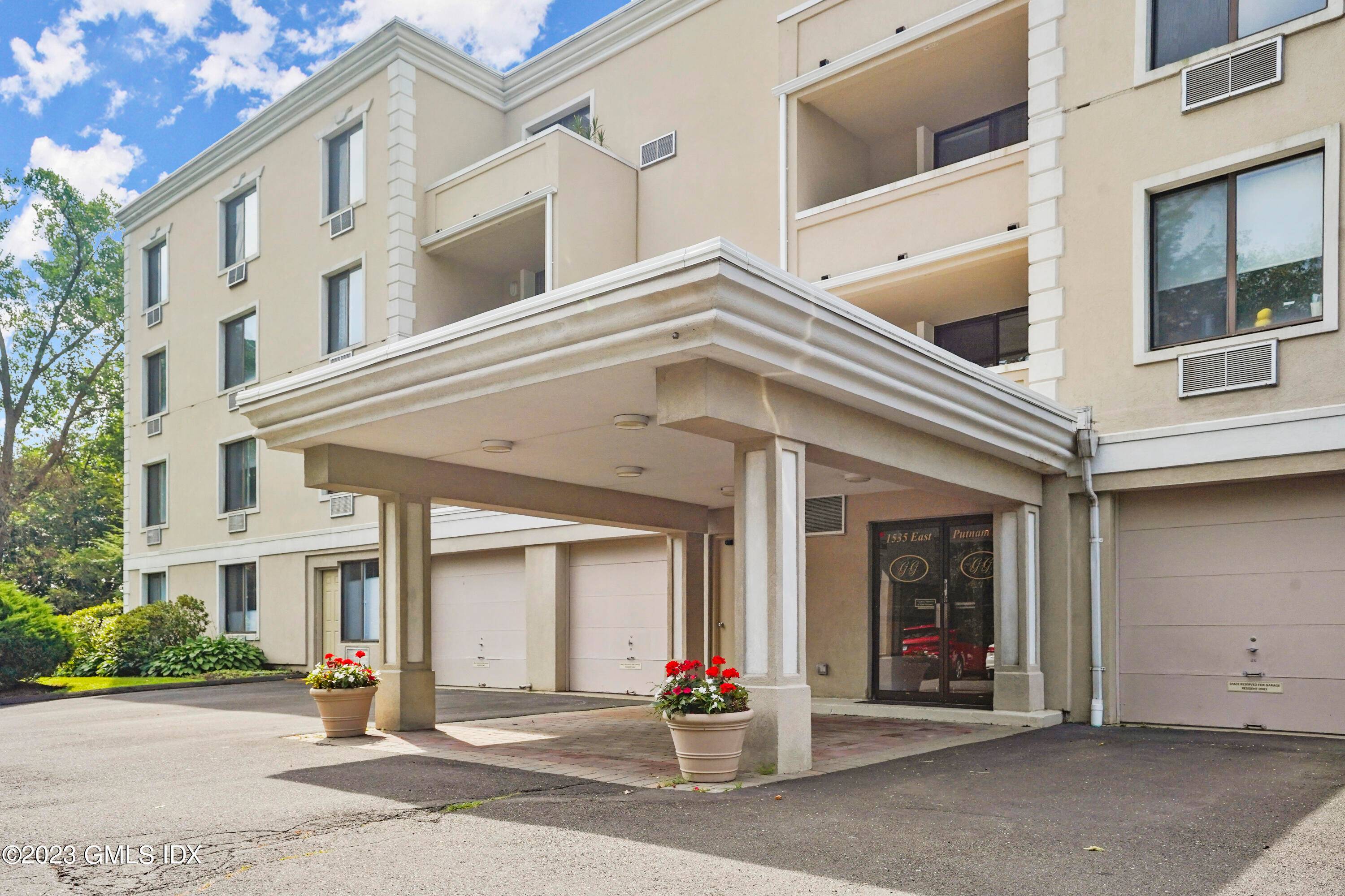One floor living in bright corner 2 BR unit with elevator, in unit washer dryer and private enclosed garage.
