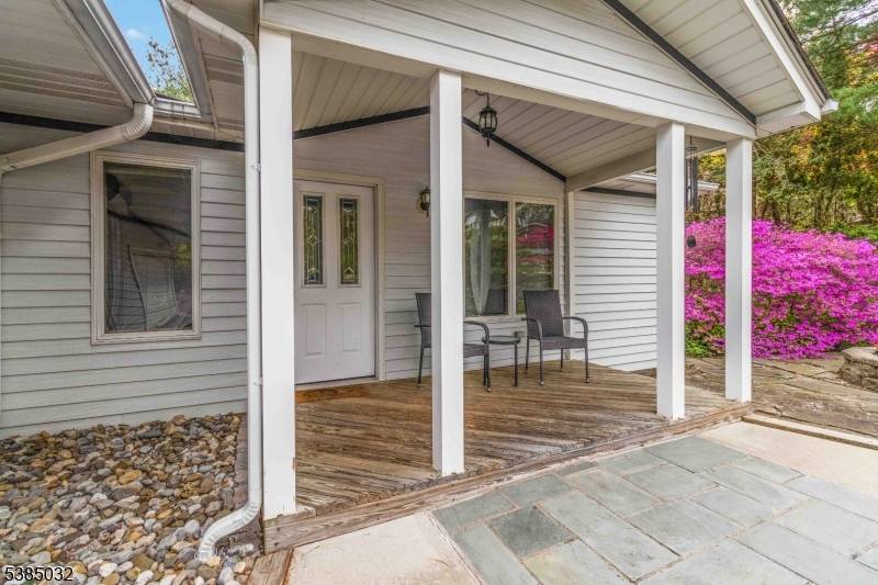 Set on just over an acre of beautifully manicured property, this expansive 4 bedroom ranch offers space, flexibility, and incredible potential for today's evolving lifestyle.