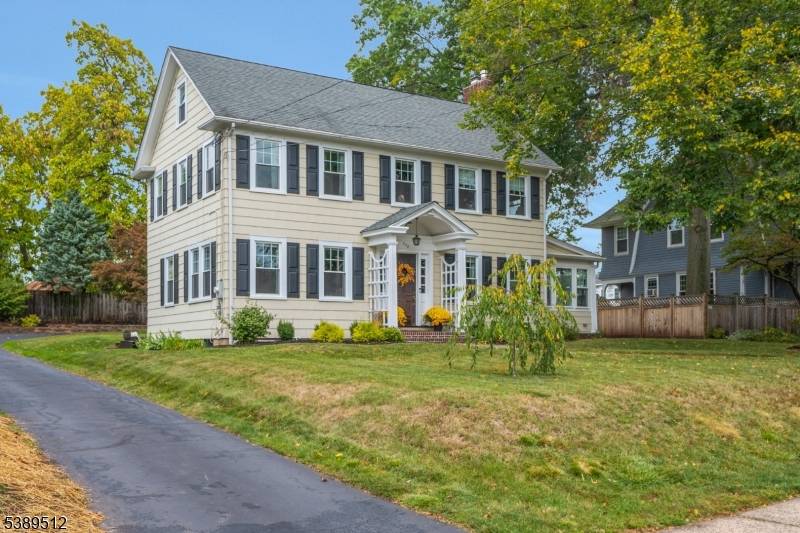 Step into timeless elegance in the heart of the highly coveted West End of Somerville.