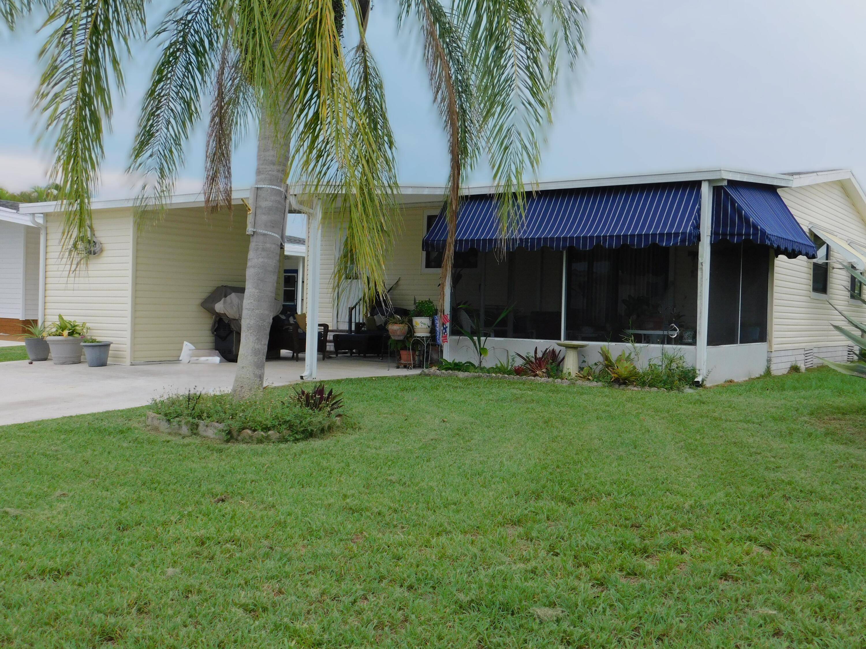 Oh so comfy. Great buy on this nice 2 bedroom, 2 bath home with nice kitchen and appliances, inviting living room, laundry room, nice screened in Florida room, storage shed.