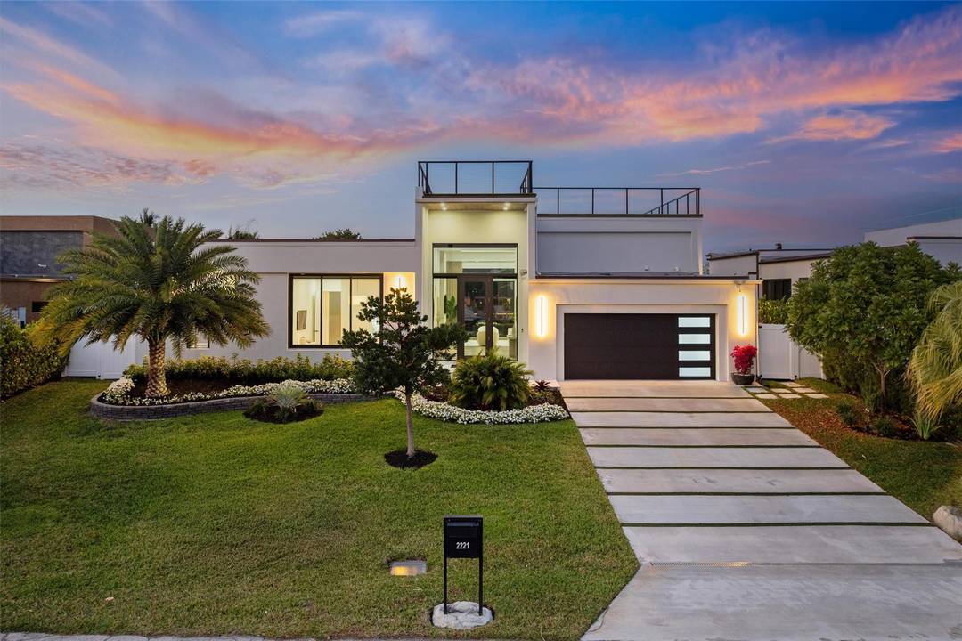 WELCOME HOME TO THIS SPECTACULAR MODERN RESIDENCE IN BAL HARBOUR, A GATED ENCLAVE OF OCEAN ACCESS WATERFRONT HOMES TUCKED AWAY IN A QUIET STRETCH OF THE MIDDLE RIVER !