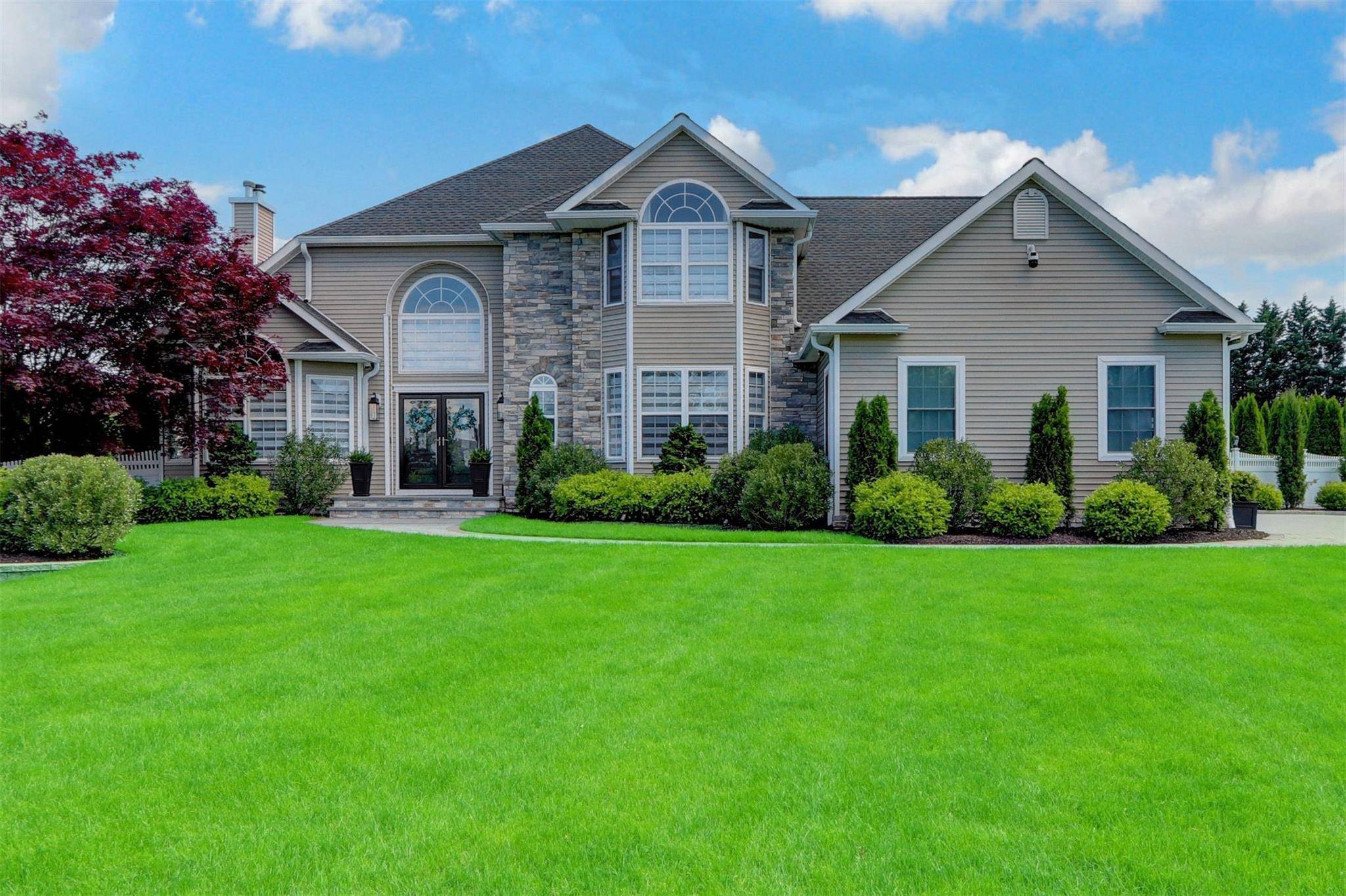 Located in the Desirable Island Estates Development this Home has all the Bells and Whistles.