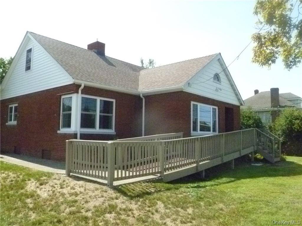 This highly visible brick office building has been freshly painted and completely renovated with new windows, new flooring and new high efficiency mechanicals.