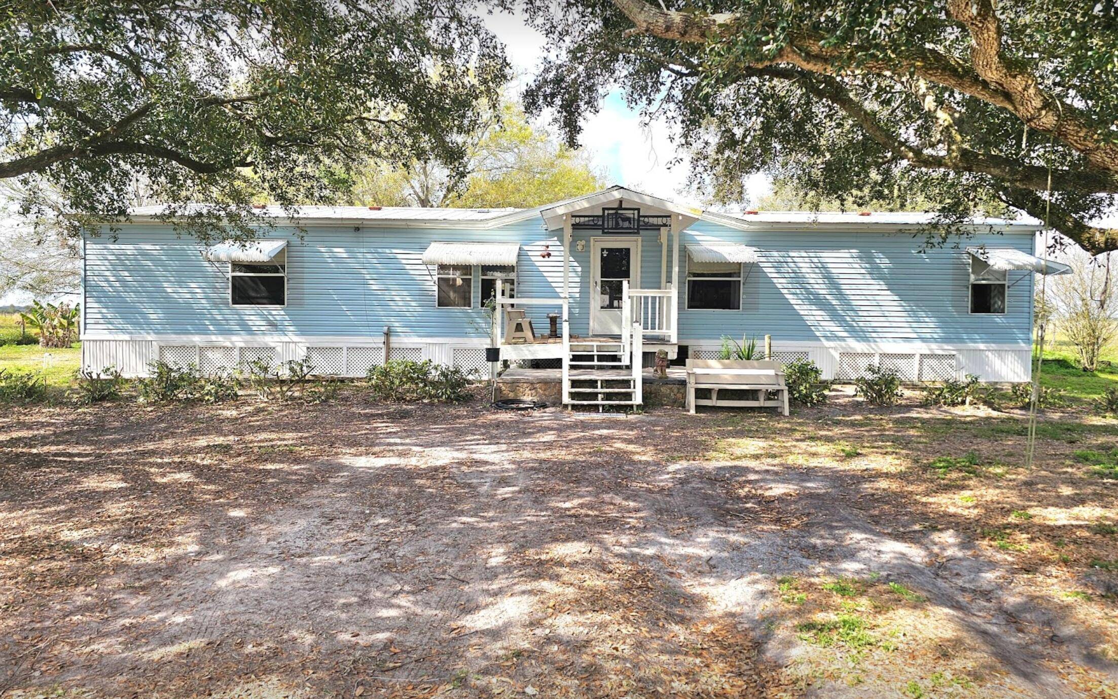 OTTER CREEK Charming DWMH PLUS a country setting PARADISE fully fenced and gated !