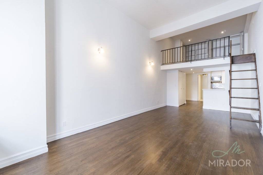 6th Floor, One bedroom Duplex, featuring a separate stainless steel kitchen, queen sized bedroom, soaring high ceilings, super sunny and tranquil.
