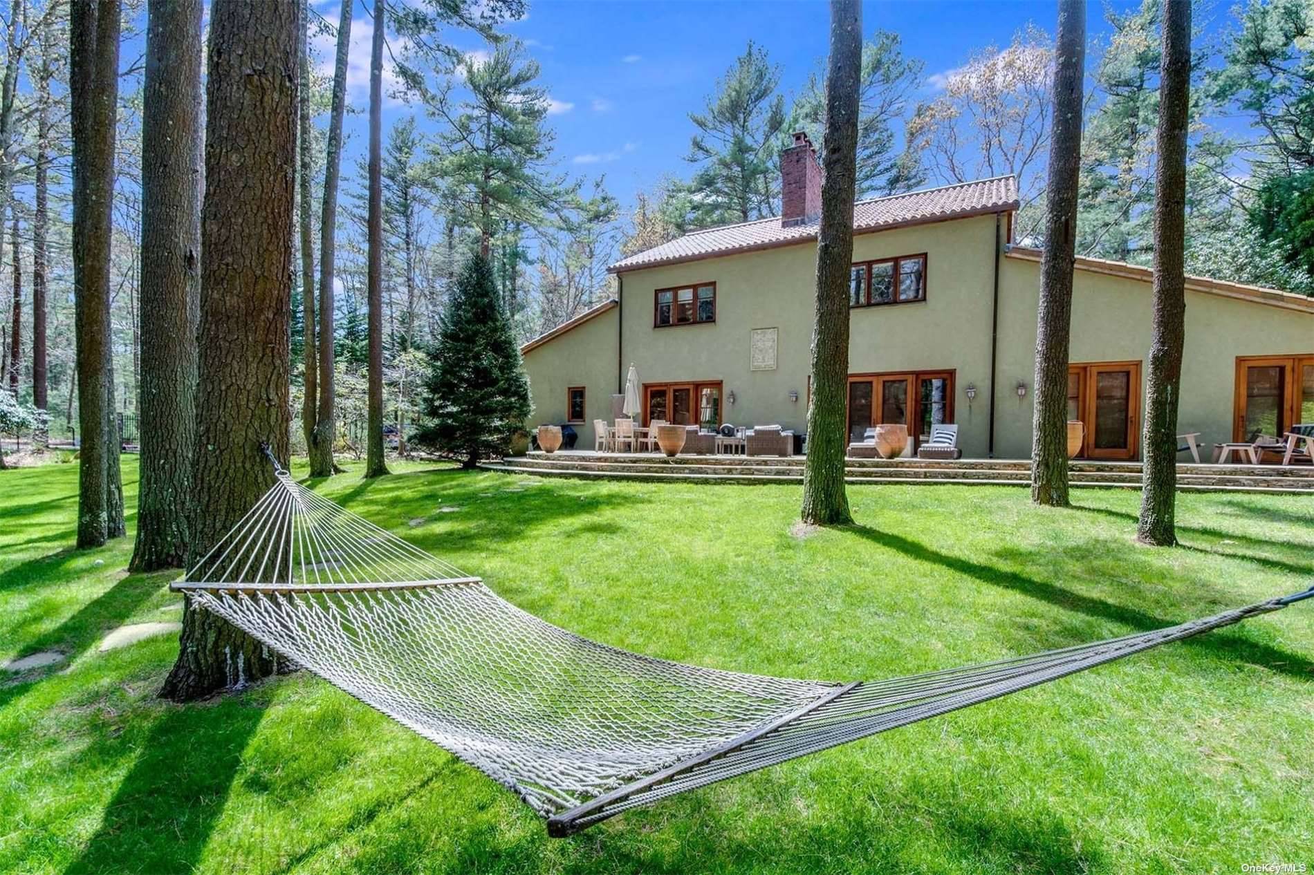 Private 2 Acre Oasis in East Hampton Perfectly renovated and beautifully detailed, this private oasis on 1.