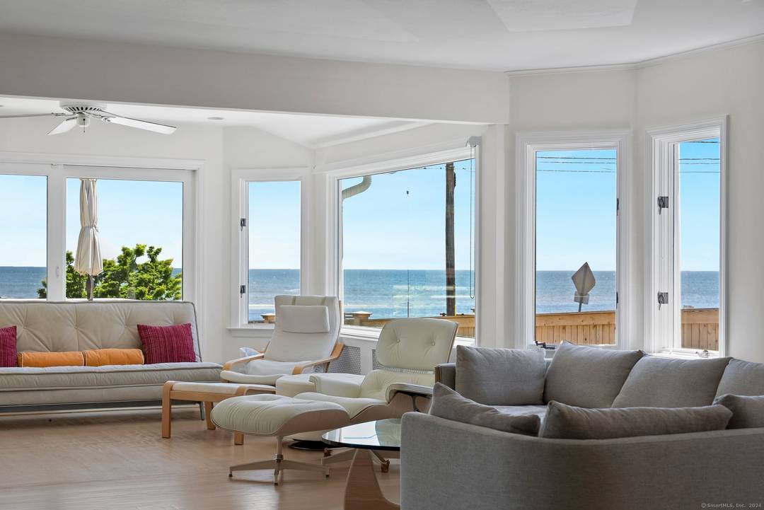 Light filled Contemporary Ranch offering breathtaking water views of the LI Sound.