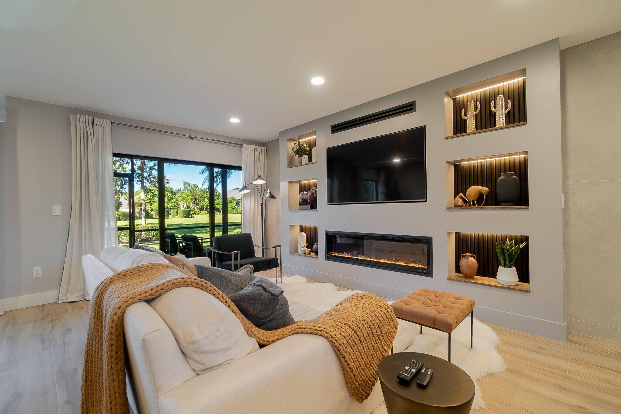Step into a beautifully totally renovated two bedroom, two bathroom one of a kind condo at the Palm Beach Polo and Country Club in Wellington.