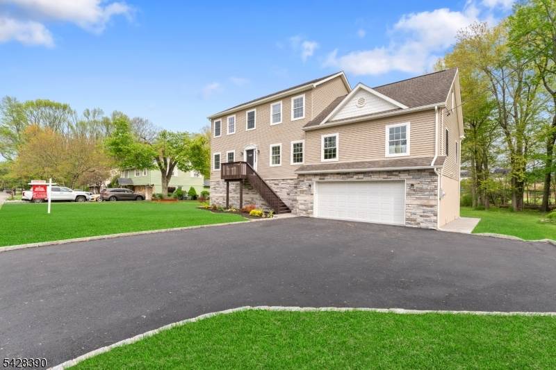 Fully renovated and super spacious, this custom home sits on a large, level lot and is truly move in ready.