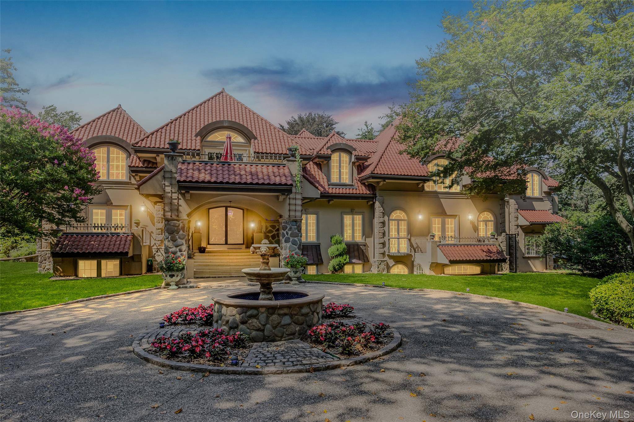 This exceptional Mediterranean inspired estate is nestled within the exclusive Village of Sands Point.