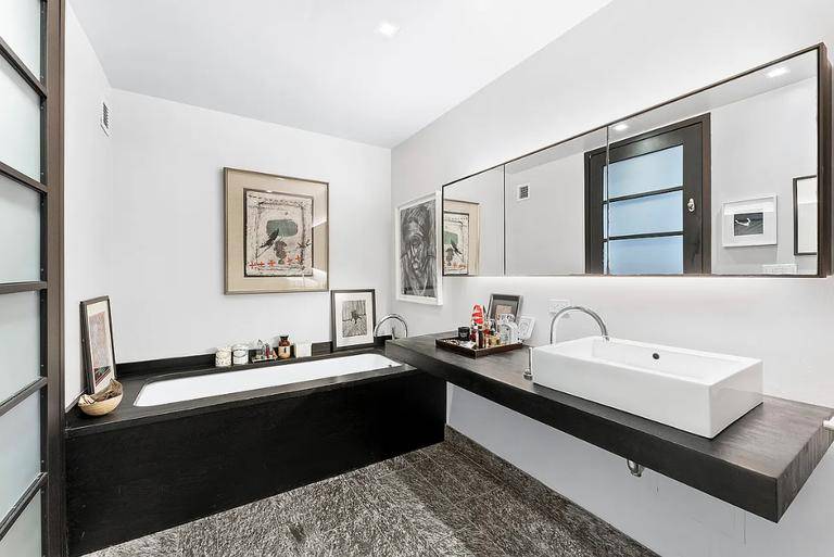 1, 204 SF Large Legal 1 bedroom Large Home Office with a door and a closet for 2 large sleeping rooms.