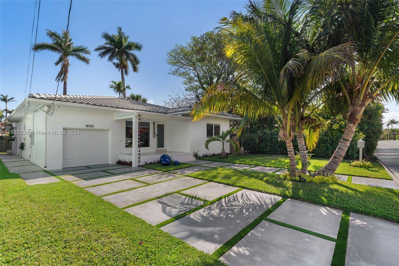 Escape to the tranquil allure of the highly sought after area of Surfside, in this completely remodeled home.