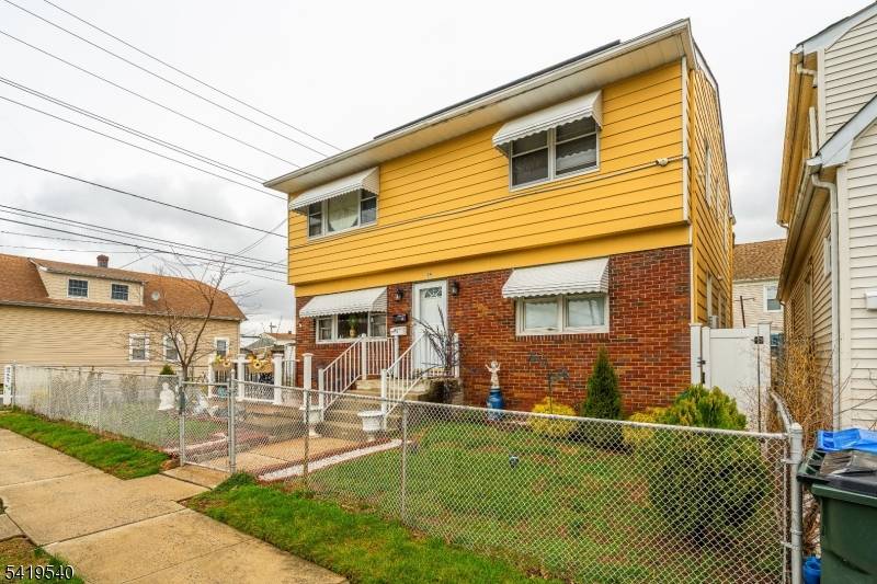 Spacious and well maintained two family home offering 3 bedrooms over 3 bedrooms perfect for investors or owner occupants !