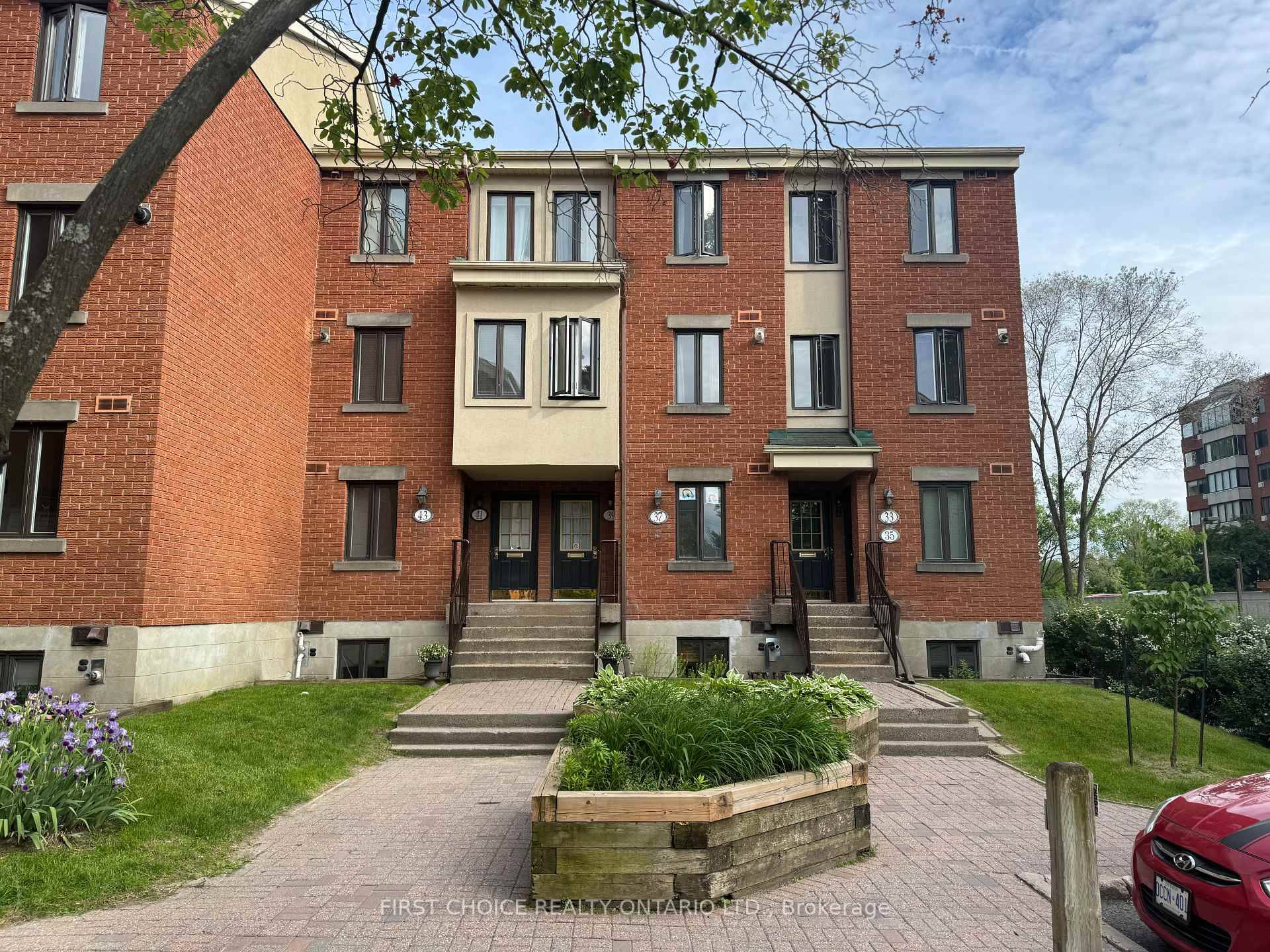 Welcome to this rarely available 3 bedroom end unit with 1.