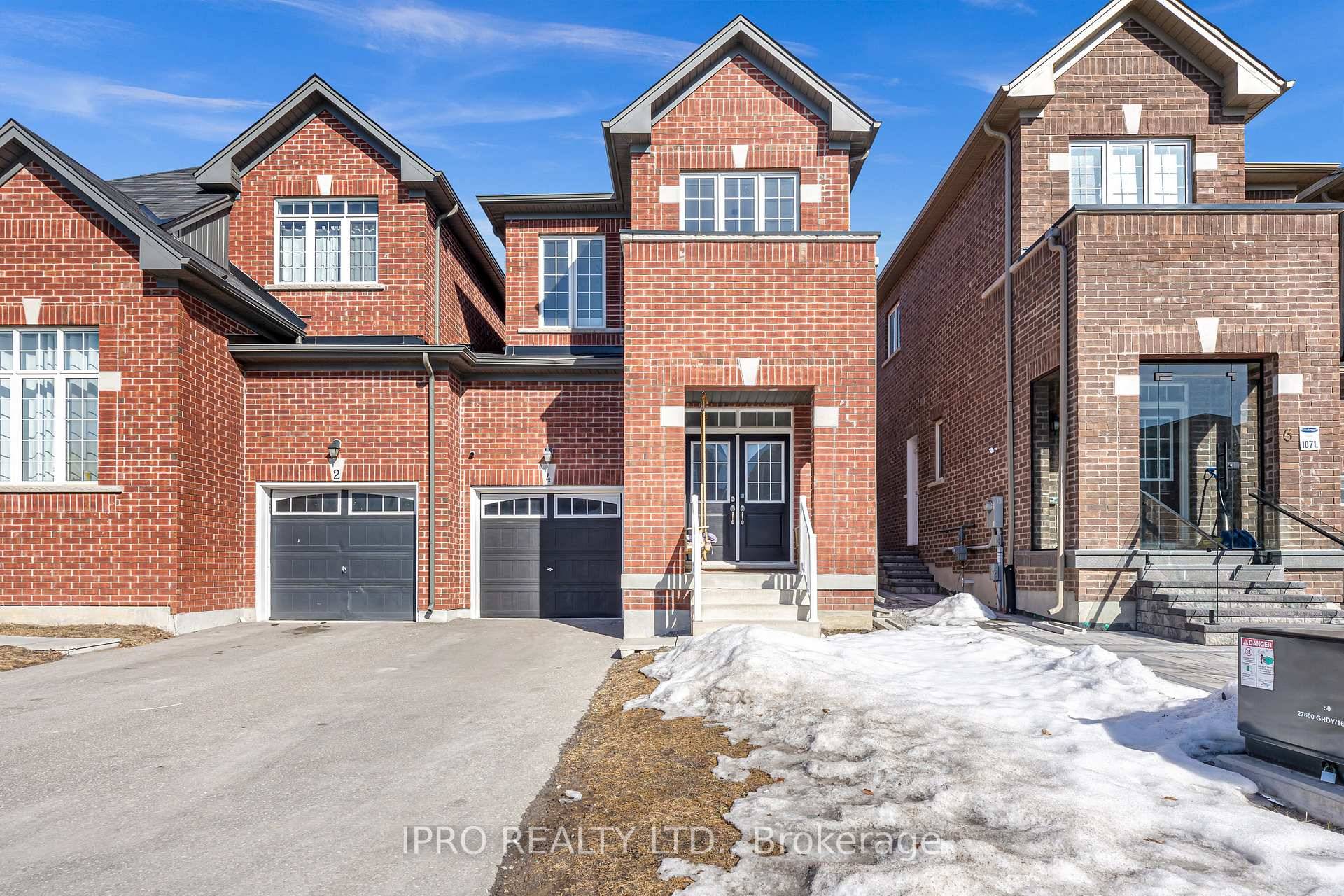 This spacious home offers a welcoming double door entry and features 9ft ceilings on both the main and second floors.