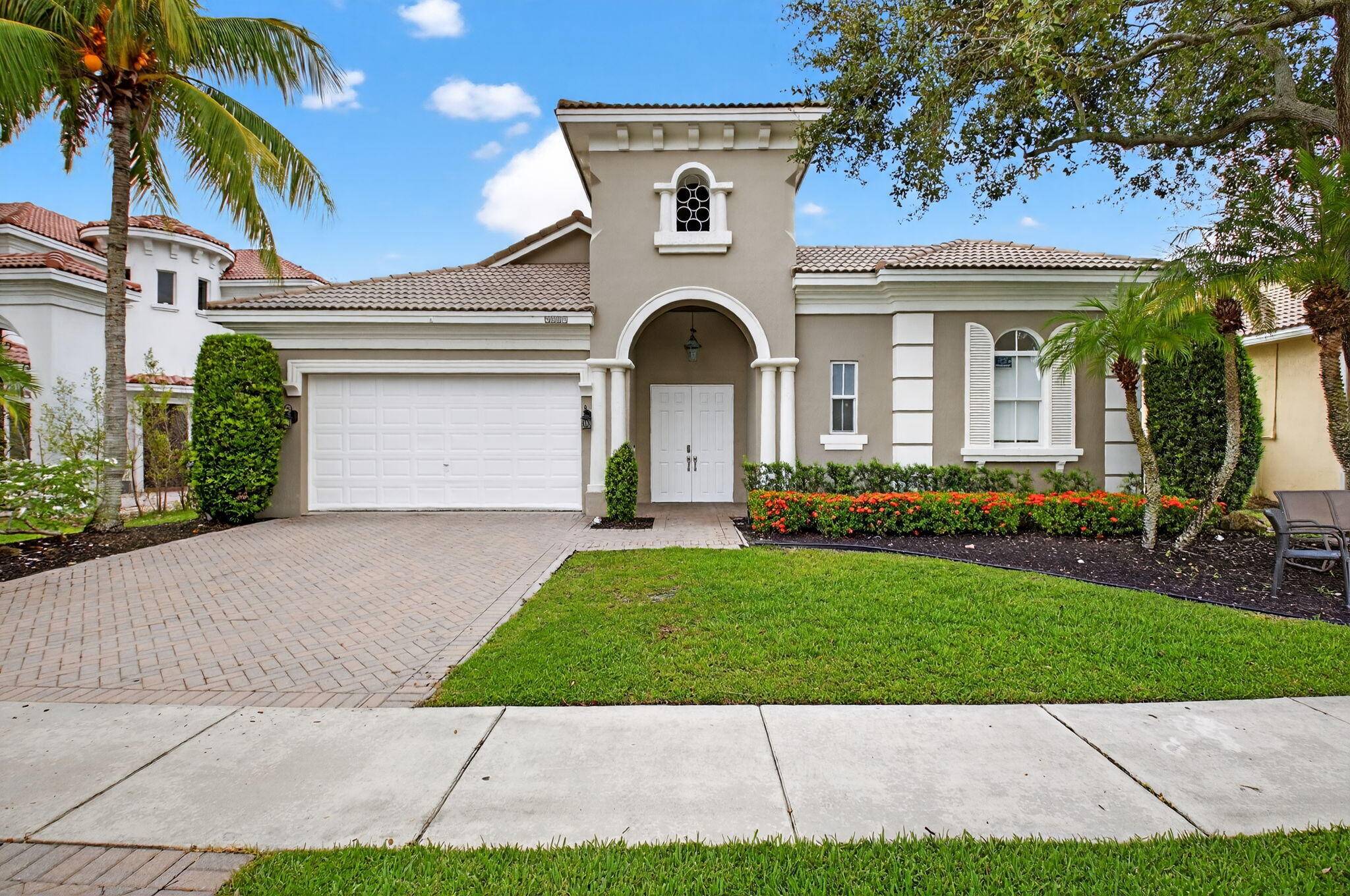 Discover this rare, fully renovated courtyard home in Palma Vista a turnkey treasure !