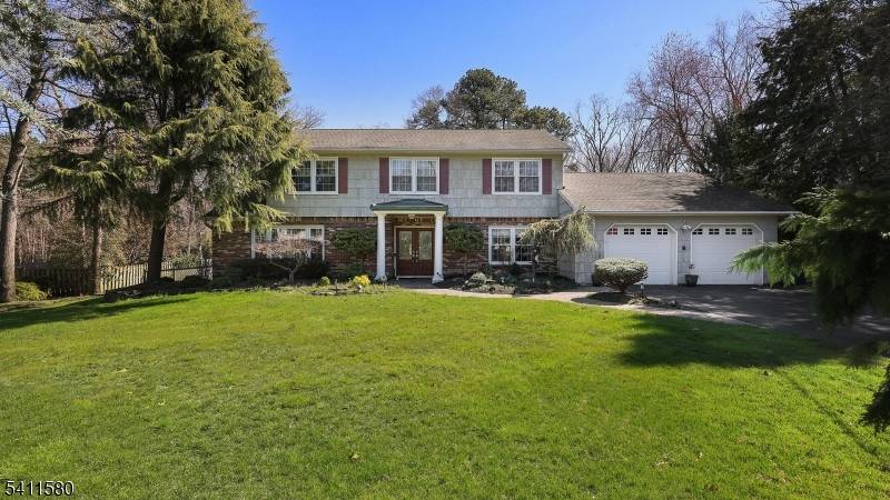 Welcome to this 5 bedroom 3.