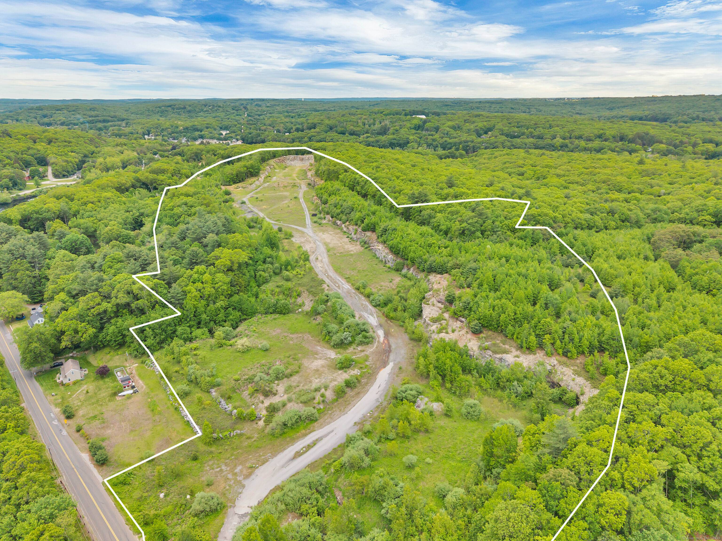 This potential 70 acre development in Sprague, Connecticut, offers a unique opportunity to build a 96 unit condominium community with two small retail centers in the town's Village Design District.