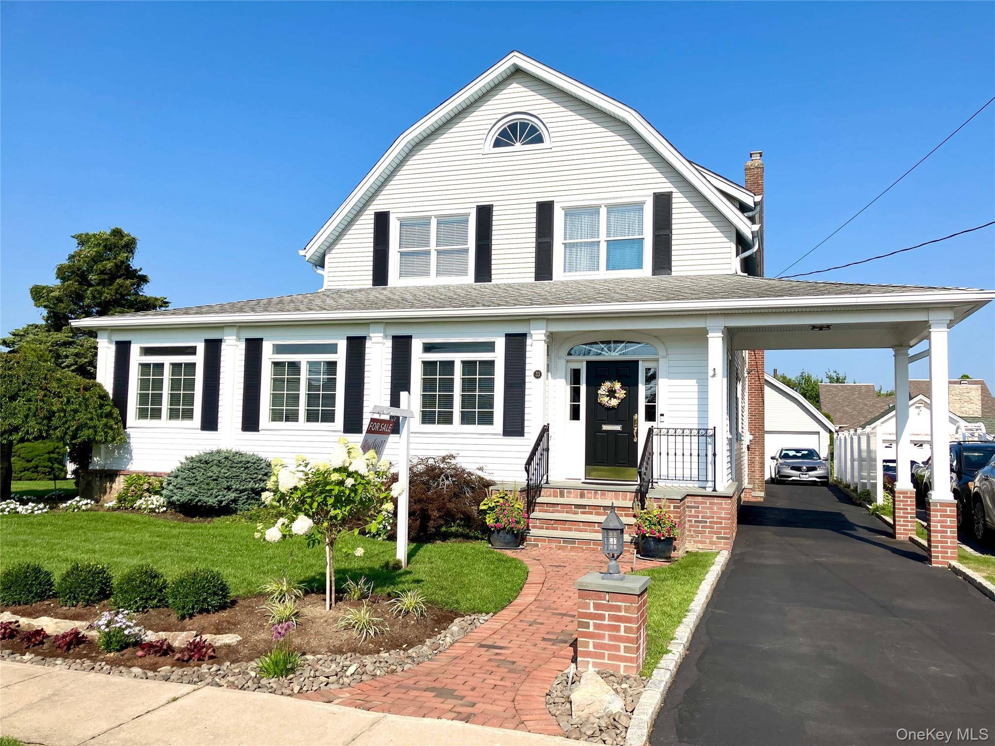 Welcome to 33 South Bay Avenue a beautifully maintained 4 bedroom, 2 bathroom waterfront home that blends historic character with modern upgrades, set on a quiet, tree lined street just ...