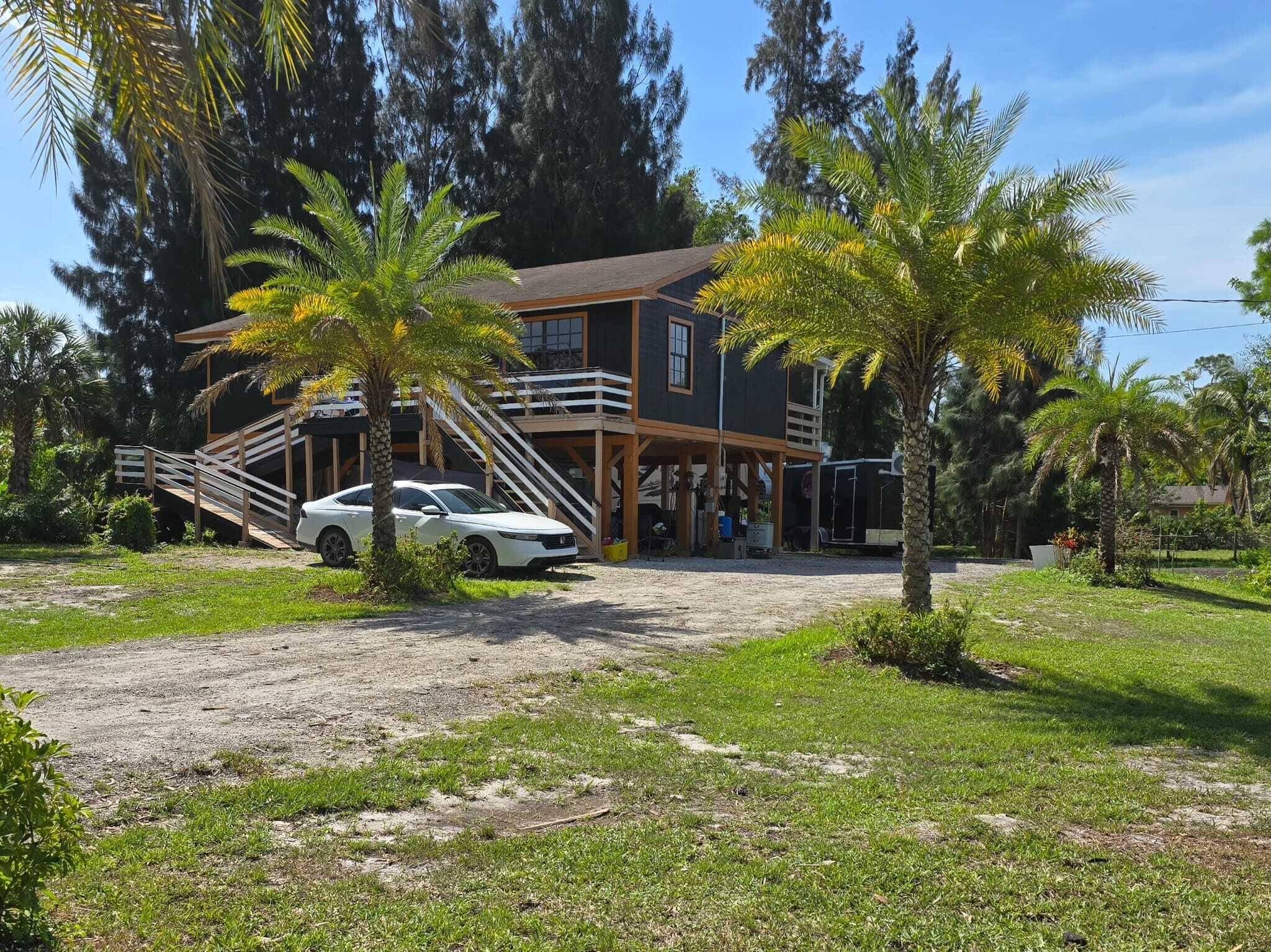 Very unique and lovely single family in the acreage, feels like vacation all year long !