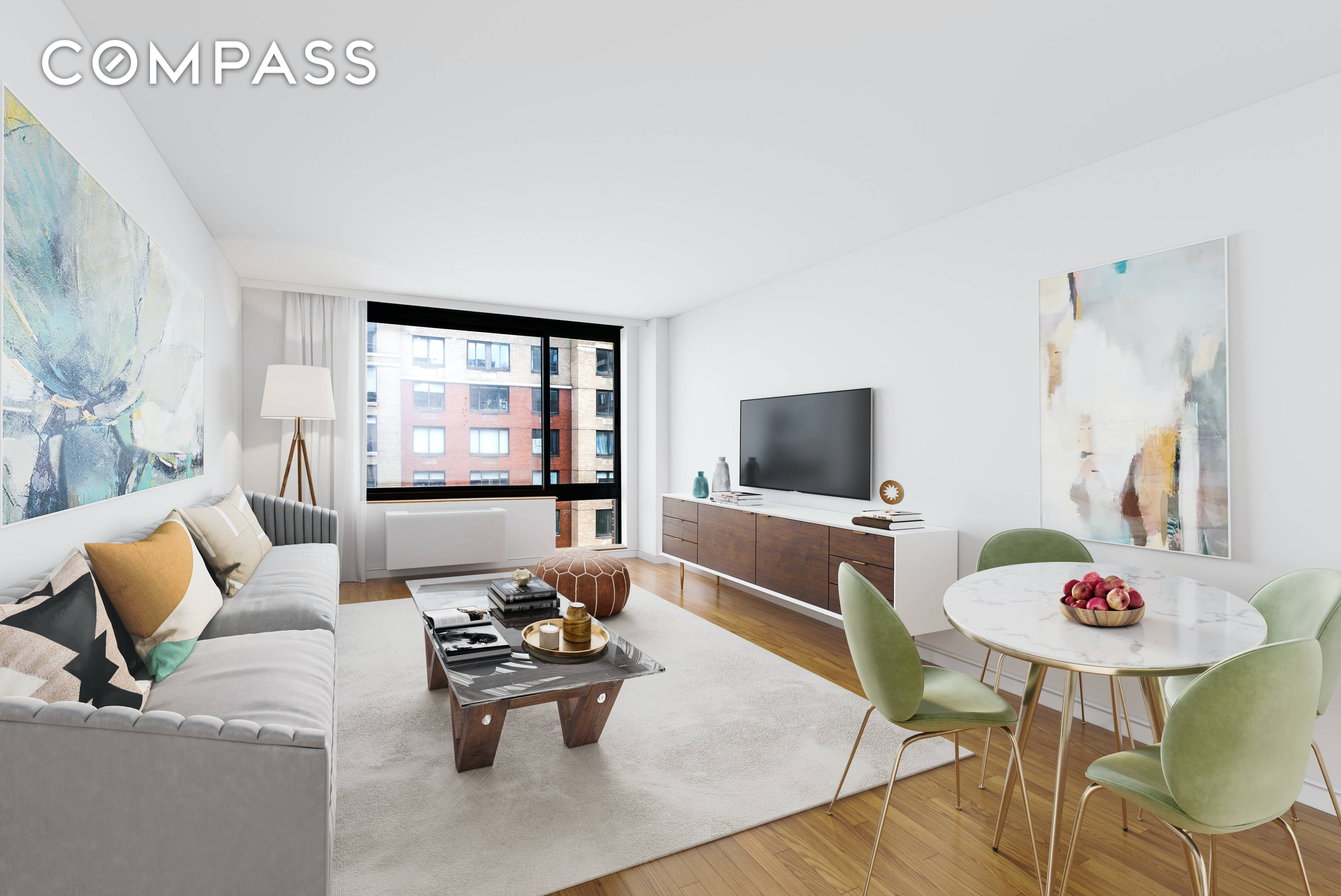 Lovely WTC views greet you the moment you enter this home featuring large windows and sleek hardwood floors.