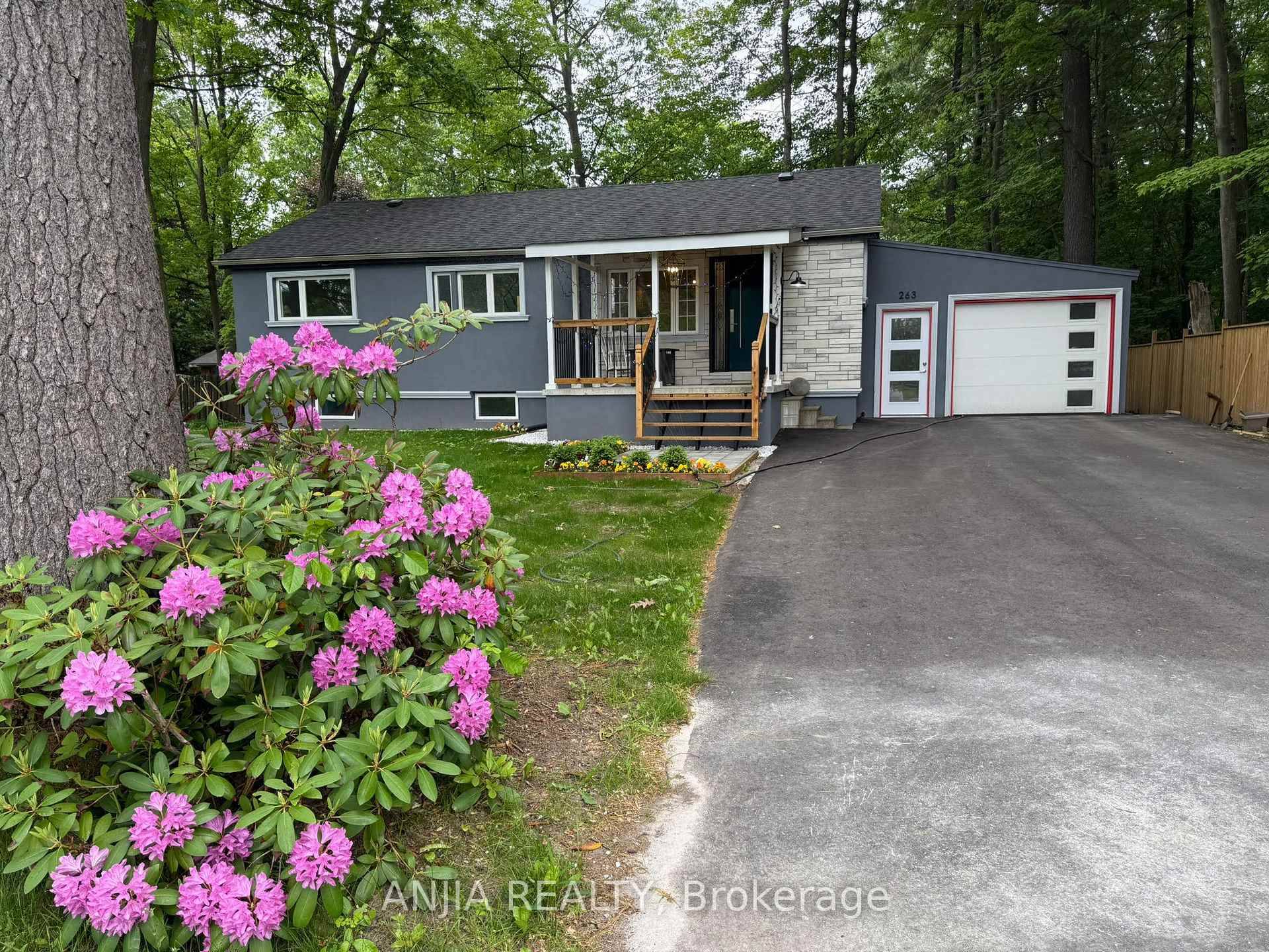 Own a Stunning, Fully Renovated Two Unit Luxury Property Blending Cottage Charm With Modern Elegance.