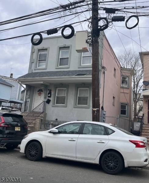 2 units with unfinished basement to be sold as is.