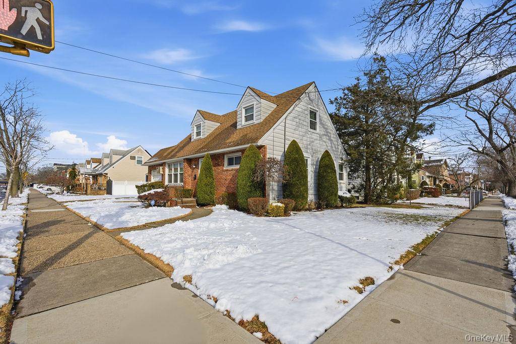 Welcome to this classic Cape Cod home perfectly situated on a spacious 50x100 corner lot in the heart of Howard Beach.
