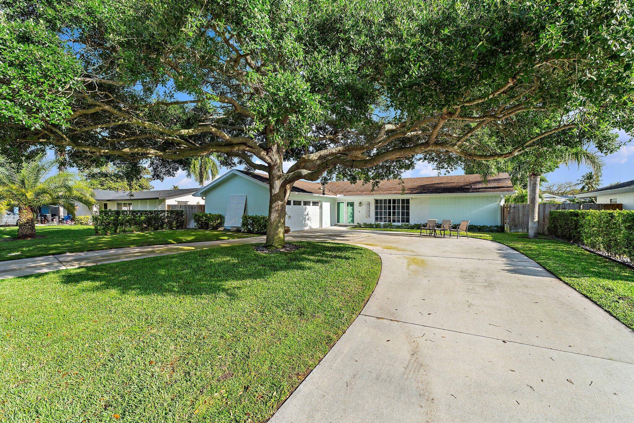 Completely renovated top to bottom with beautiful high end finishes POOL home located within the heart of Palm Beach Gardens with NO HOA !