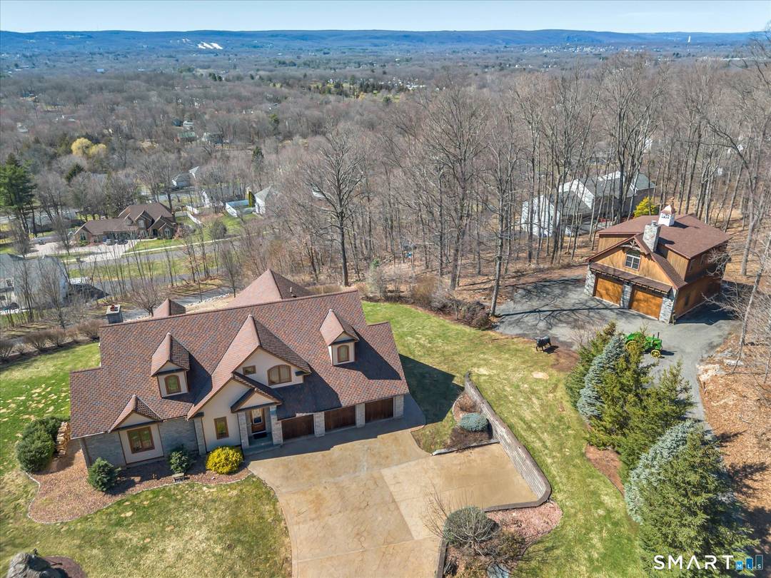 Perched high above Southington on over 2 private acres, this Custom built Cape Style home offers more than 3200 sq ft of thoughtfully designed living space, a 5 car garage ...
