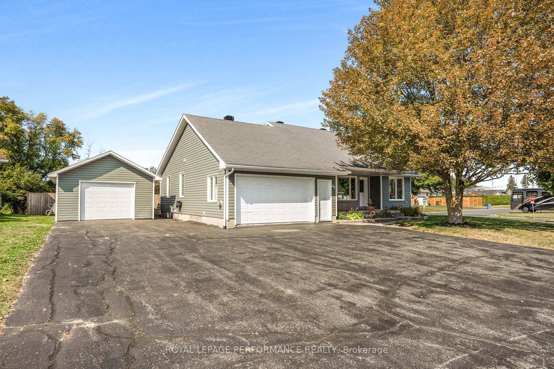 Casselman Gem on Corner Lot 3 1 Bedrooms with Garage Space Galore !